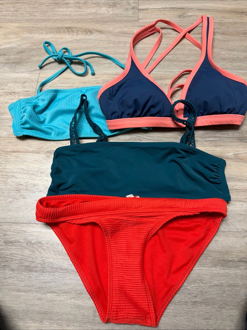 Lot of 3 Medium Bathing Suit Tops and 1 Bottom.